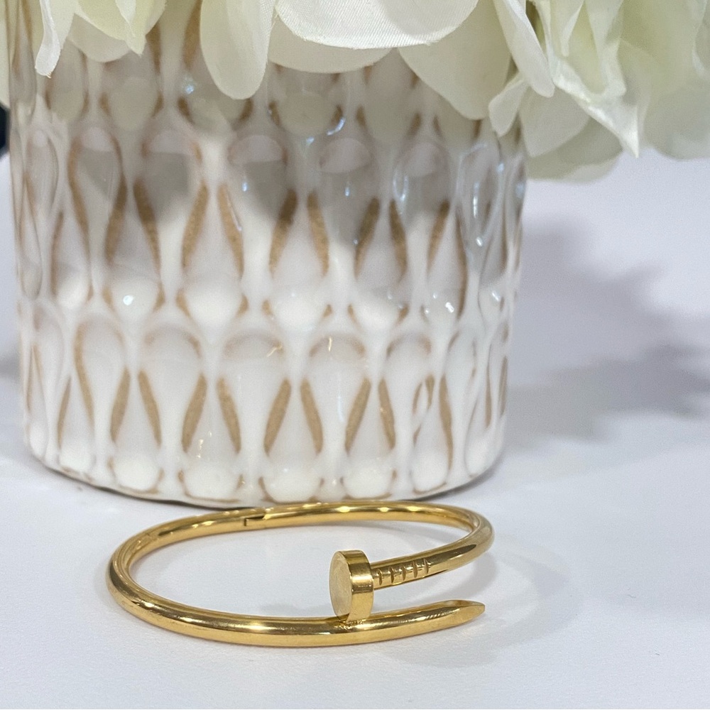 309. Stainless Steel Nail shaped Cuff Bracelet in Gold tone